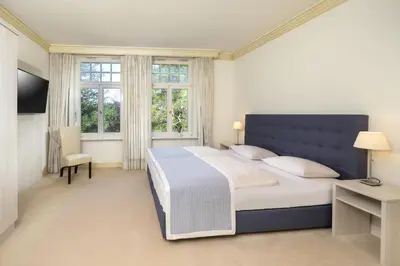 Ein Bett oder Betten in einem Zimmer der Unterkunft Ferienhaus Golfpark
