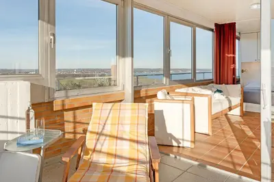 Ein Sitzbereich in der Unterkunft Panoramic Wellenblick