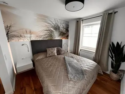 Ein Bett oder Betten in einem Zimmer der Unterkunft Cosy Dream Scharbeutz