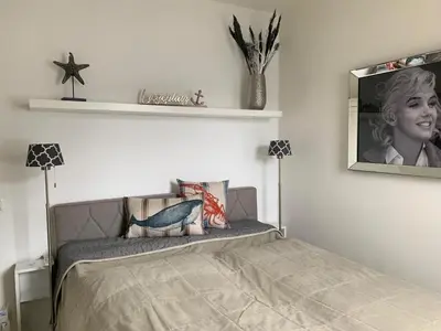 Ein Bett oder Betten in einem Zimmer der Unterkunft Little Dream Timmendorfer Strand