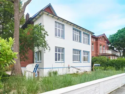 Ein Garten an der Unterkunft Villa Dünenblick Apartment Seepferdchen
