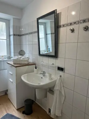 Ein Badezimmer in der Unterkunft Sandy Coast Apartment Souterrain