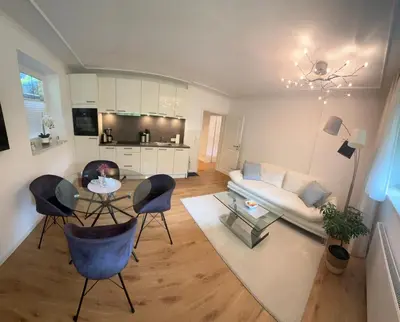 TV/Unterhaltungsangebot in der Unterkunft Sandy Coast Apartment Souterrain