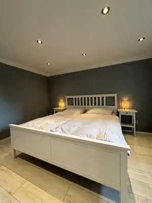 Ein Bett oder Betten in einem Zimmer der Unterkunft Landhof Schadehorn 