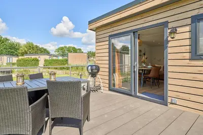 Ein Balkon oder eine Terrasse in der Unterkunft Ostseecamp Ferienhaus 