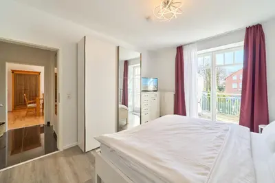 Ein Bett oder Betten in einem Zimmer der Unterkunft Strandallee 150a Timmendorfer Strand