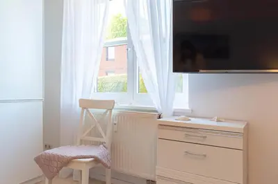 TV/Unterhaltungsangebot in der Unterkunft Ferienwohnung Ostseekoje - Haffkrug