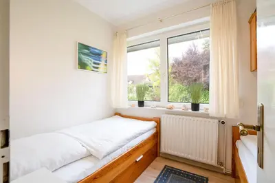 Ein Bett oder Betten in einem Zimmer der Unterkunft Ferienhaus Luis