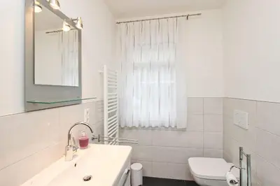 Ein Badezimmer in der Unterkunft Appartementhaus Zur Sonne - Whg. 2