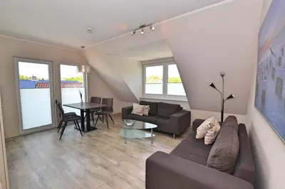 Ein Sitzbereich in der Unterkunft Appartementhaus Zur Sonne - Whg. F