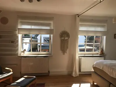 Ein Bett oder Betten in einem Zimmer der Unterkunft Gemütliche Eigentumswohnung in Lübeck