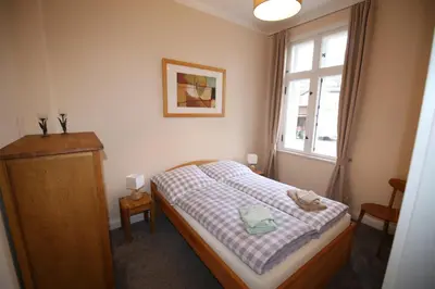 Ein Bett oder Betten in einem Zimmer der Unterkunft Herrenhaus Hohewarte
