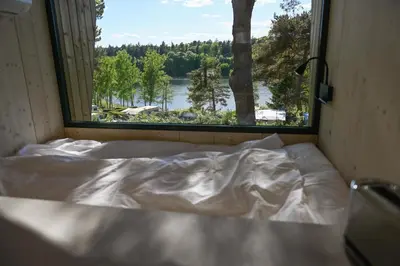 Ein Bett oder Betten in einem Zimmer der Unterkunft Green Tiny Spot Salemer See - Tiny House Nook 5