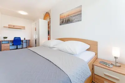 Ein Bett oder Betten in einem Zimmer der Unterkunft Panoramic Küstenflair Sierksdorf