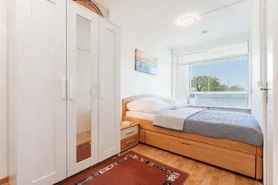 Ein Bett oder Betten in einem Zimmer der Unterkunft Panoramic Küstenflair Sierksdorf