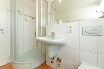 Ein Badezimmer in der Unterkunft Nimm dir Zeit für Meer