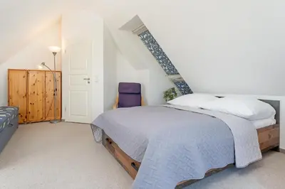 Ein Bett oder Betten in einem Zimmer der Unterkunft Nimm dir Zeit für Meer