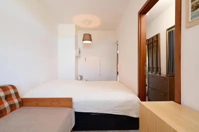 Ein Bett oder Betten in einem Zimmer der Unterkunft Berliner Hof App 303