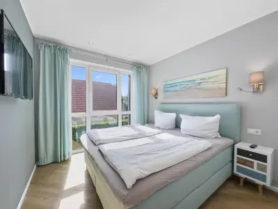 Ein Bett oder Betten in einem Zimmer der Unterkunft Objekt-Nr 35 - Strand - Steuerbord