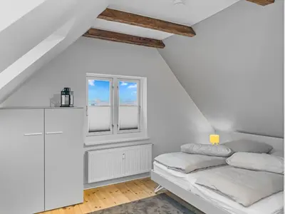 Ein Bett oder Betten in einem Zimmer der Unterkunft Objekt-Nr 154 - Hafen - Vorderreihe