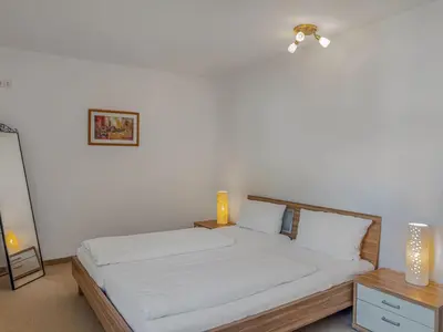 Ein Bett oder Betten in einem Zimmer der Unterkunft Objekt-Nr 11 - Priwall - Pötenitzer Weg
