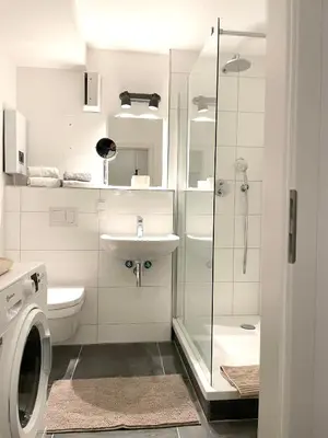 Ein Badezimmer in der Unterkunft MeerZeit mit Schwimmbad und Sauna