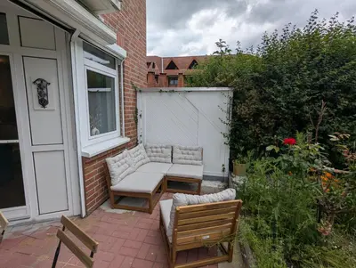 Ein Garten an der Unterkunft HejU - Gemütliche Auszeit am Meer
