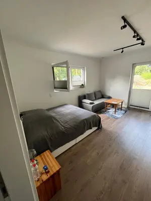 Ein Bett oder Betten in einem Zimmer der Unterkunft Gemütliche 1-Zimmer Gästewohnung