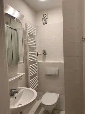 Ein Badezimmer in der Unterkunft Stilvolle Wohnung mit Balkon Perfekt für Städtetrip Lübeck