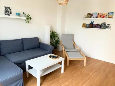 Ein Sitzbereich in der Unterkunft Stilvolle Wohnung mit Balkon Perfekt für Städtetrip Lübeck