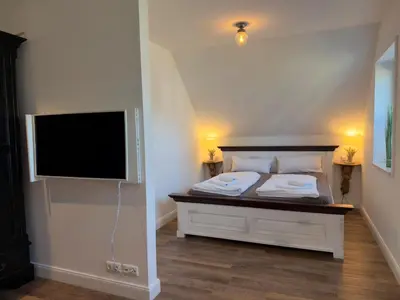 Ein Bett oder Betten in einem Zimmer der Unterkunft Objekt-Nr 139 - Priwall - Mecklenburger Landstraße