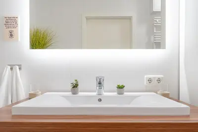 Ein Badezimmer in der Unterkunft Hang 15 Rosis Jolle