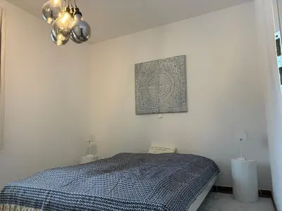 Ein Bett oder Betten in einem Zimmer der Unterkunft Strandperle