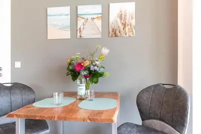 Ein Sitzbereich in der Unterkunft Ferienwohnung Die Hanse 14 Scharbeutz