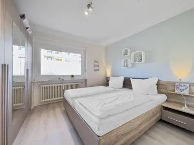 Ein Bett oder Betten in einem Zimmer der Unterkunft Objekt-Nr 211 - Ort - Nordmeerstraße