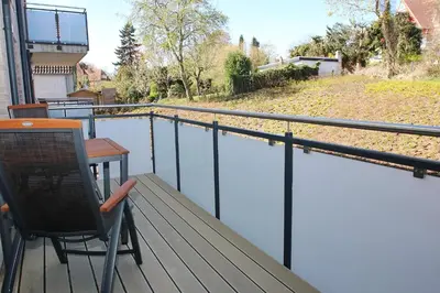 Ein Balkon oder eine Terrasse in der Unterkunft Dünenhaus Steuerbord, Fewo 112