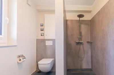 Ein Badezimmer in der Unterkunft Dünenhaus Steuerbord, Fewo 138