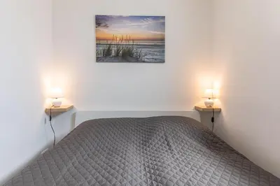 Ein Bett oder Betten in einem Zimmer der Unterkunft Haus Aaron Fehlingstraße, Fewo 221