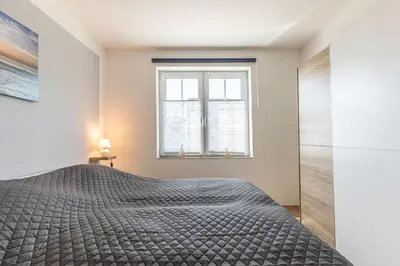 Ein Bett oder Betten in einem Zimmer der Unterkunft Haus Aaron Fehlingstraße, Fewo 223