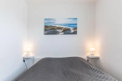 Ein Bett oder Betten in einem Zimmer der Unterkunft Haus Aaron Fehlingstraße, Fewo 223