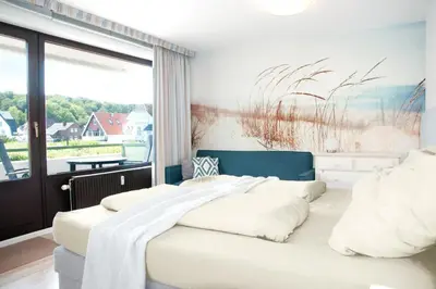 Ein Bett oder Betten in einem Zimmer der Unterkunft Kaiserallee Fewo 193