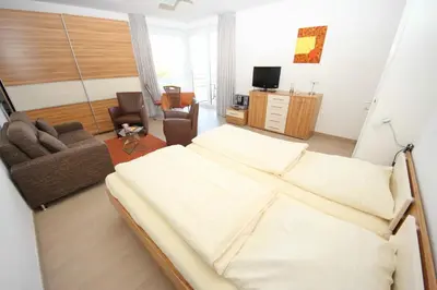 Ein Bett oder Betten in einem Zimmer der Unterkunft Strandblick, Fewo 164