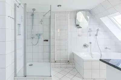 Ein Badezimmer in der Unterkunft Kurgartenstraße, Ferienhaus 158