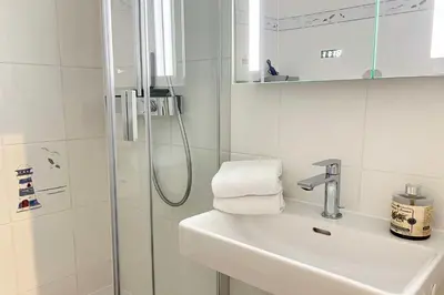 Ein Badezimmer in der Unterkunft Kaiserallee, Fewo 215