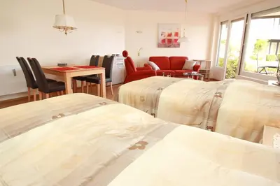 Ein Bett oder Betten in einem Zimmer der Unterkunft Kaiserallee, Fewo 211