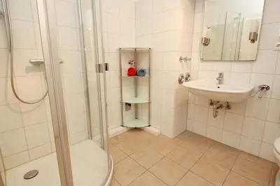 Ein Badezimmer in der Unterkunft Kaiserallee, Fewo 211