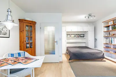 Ein Bett oder Betten in einem Zimmer der Unterkunft Kaiserallee, Fewo 198