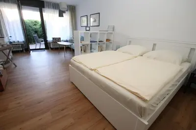 Ein Bett oder Betten in einem Zimmer der Unterkunft Strandredder, Fewo 171