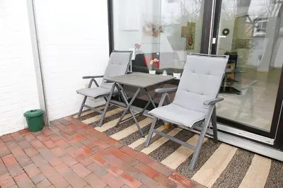 Ein Balkon oder eine Terrasse in der Unterkunft Strandredder, Fewo 114