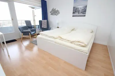 Ein Bett oder Betten in einem Zimmer der Unterkunft Trelleborgallee, Fewo 133